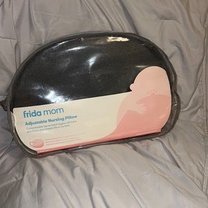 Brand new. Never opened.Frida mom adjustable nursing pillow
